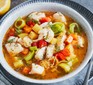 Bowl of fish soup with vegetables