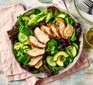 Air fryer-cooked chicken breasts in a salad