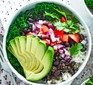 Burrito bowl with chipotle black beans, chopped onion, tomatoes and white rice