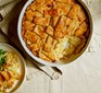 Cheesy potato patchwork pie in a baking dish