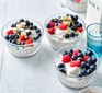 Bowls of chia and almond overnight oats topped with berries