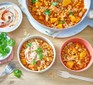 Two servings of chicken, squash & chickpea stew