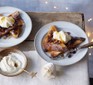 Two servings of panettone French toast with crème fraîche