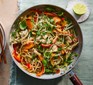 Healthy chicken pad Thai in a wok