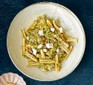 A serving of leek, walnut & goat's cheese pasta