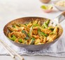 Lemongrass & coconut chicken stir-fry in a wok