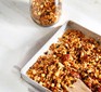 Nuts and seeds granola on a baking tray