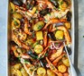 One-pan seafood roast with smoky garlic butter served in a roasting tray