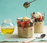 Overnight oats served with berries and honey