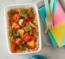 Paneer jalfrezi with brown rice in a lunch box