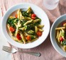 Pesto spinach penne in bowls
