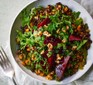 One serving of puy lentil salad with beetroot & walnuts on a plate