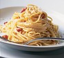 Close up of perfect spaghetti carbonara on a plate ready to eat