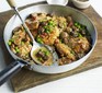 Chicken casserole with mushrooms, peas and sauce