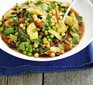 A bowl of vegetable tagine with summer vegetables, and pulses