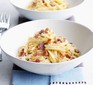 Two bowls of spaghetti carbonara without cream