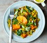 Spinach, sweet potato and lentil dhal with fork on plate