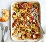 Healthy sausage traybake served in a casserole dish